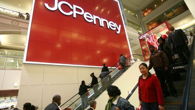 FILE - In this Friday, Oct. 23, 2009 file photo, shoppers visit a J.C. Penney store in New York. J.C. Penney Co. is reporting a 78 percent drop in its third-quarter earnings Friday, Nov. 13, 2009, because of a big expense to fund its pension plan. The company announced on Friday, Feb. 24, 2017, that it will be closing between 130 and 140 stores by the end of the second quarter of 2017. (AP Photo/Mark Lennihan, file)