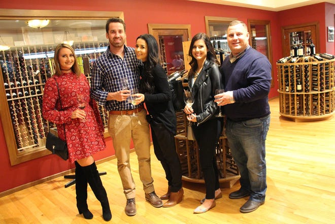 From left: Ashley Erling, Kevin Weber, Chelsey Vallante, Rebecca Oliver and John Oliver attend Nutmeg Animal Welfare's "Tour of Italy" wine-tasting at Gasbarro's Wines, in Providence, held Friday, Oct. 28.

Erik Scalavino