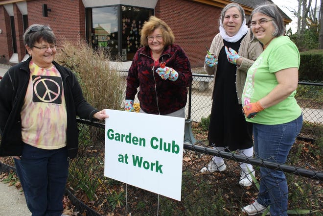 The Greenleaf Garden Club of Milford put the library gardens to bed recently. Pictured, from left: Patsy Timmons, Carol Burke, Guru S.K. Khalsa-Bob and Ellen Todd. Not pictured: Barbara Dwyer and Hazel Schroder. Courtesy Photo