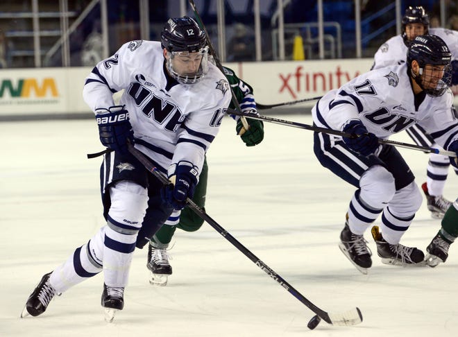 New Hampshire's Shane Eiserman drives to the net during Saturday's 3-0 win over Mercyhurst at the Whittemore Center in Durham.

Photo by Blake Gumprecht/Fosters.com