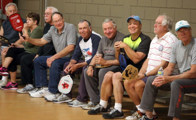 Pickleball players wait for their games to start at the Frank Brown Park Gym in Panama City Beach in 2015. ANDREW WARDLOW/The News Herald