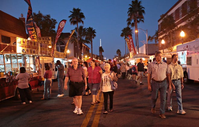 Harrison Avenue fills with locals during Friday Fest, the last of the scheduled monthly festivities before upcoming changes are put in place next year. HEATHER HOWARD/THE NEWS HERALD