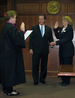 Charlotte Sheppard became Hendersonville's newest attorney when she was sworn in by Chief District Court Judge Athena Brooks during a recent ceremony that included North Carolina District Attorney Greg Newman, Sheppard's co-worker in Ohio 24 years ago. 

SPECIAL TO THE TIMES-NEWS