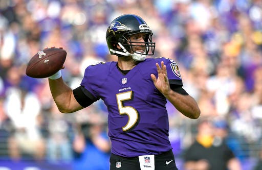 Baltimore Ravens quarterback Joe Flacco throws to a receiver in the first half of an NFL football game against the Pittsburgh Steelers, Sunday, Nov. 6, 2016, in Baltimore. (AP Photo/Nick Wass)