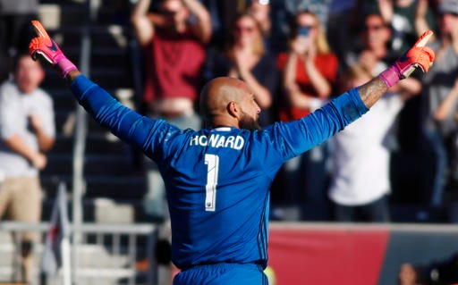 Colorado Rapids goalkeeper Tim Howard celebrates after stopping Los Angeles Galaxy defender Jeff Larentowicz's shootout kick in the second leg soccer match of the Western Conference semifinals of the MLS cup playoffs in Commerce City, Colo., on Sunday, Nov. 6, 2016. Colorado won 1-0 and advances to the next round of the playoffs. (AP Photo/David Zalubowski)