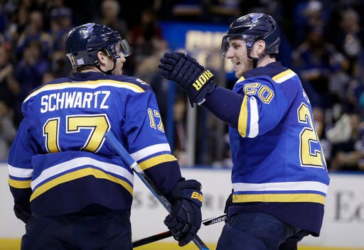St. Louis Blues' Alexander Steen (20) is congratulated by Jaden Schwartz after scoring during the second period of an NHL hockey game against the Colorado Avalanche, Sunday, Nov. 6, 2016, in St. Louis. Schwartz was credited with the goal. (AP Photo/Jeff Roberson)