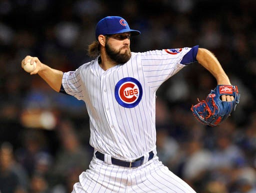FILE - This Sept. 19, 2016 file photo shows Chicago Cubs starter Jason Hammel delivering a pitch during the first inning of a baseball game against the Cincinnati Reds in Chicago. The Chicago Cubs declined Hammel's $12 million option for next season, opening a spot in their rotation and making the right-hander one of the top starters on the free-agent market. The World Series champions announced the move Sunday, Nov. 6, 2016. Hammel gets a $2 million buyout. (AP Photo/Paul Beaty)