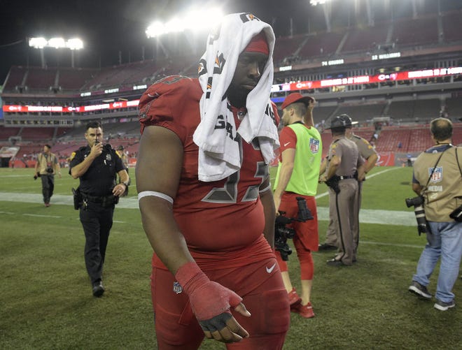 Tampa Bay Buccaneers defensive tackle Gerald McCoy leaves the field after the Bucs lost to the Atlanta Falcons, 43-28, Thursday, at Raymond James Stadium in Tampa. THE ASSOCIATED PRESS / PHELAN M EBENHACK