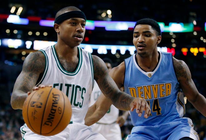 Denver Nuggets' Gary Harris, right, defends against Boston Celtics' Isaiah Thomas during the first quarter of an NBA basketball game in Boston, Sunday, Nov. 6, 2016.