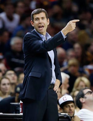 Boston Celtics head coach Brad Stevens directs his team against the Cleveland Cavaliers during the second half of an NBA basketball game Thursday, Nov. 3, 2016, in Cleveland. The Cavaliers won 128-122.