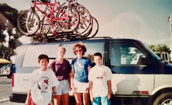 Gone but hardly forgotten: The Perry family’s beloved AWD Chevy Astro workhorse, complete with its six-bike rack, plus big hair and big smiles. (Larry Perry)