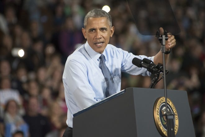 President Obama speaks at the Whittemore Center on Monday. John Huff/Fosters.com