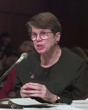 FILE - In this March 17, 1999, file photo, U.S. Attorney General Janet Reno testifies before the Senate Governmental Committee in Washington. The committee is considering whether to renew the Independent Counsel Statute. Reno, the first woman to serve as U.S. attorney general and the epicenter of several political storms during the Clinton administration, has died early Monday, Nov. 7, 2016. She was 78. (AP Photo/Dennis Cook, File)