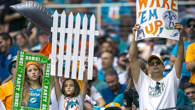 Miami Dolphins fans during their game against the New York Jets Sunday November 06, 2016 at Hard Rock Stadium in Miami Gardens. (Bill Ingram / The Palm Beach Post)