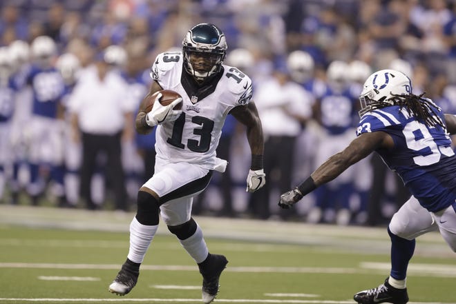 In this Aug. 27, 2016, file photo, then-Philadelphia Eagles wide receiver Josh Huff (13) runs against the Indianapolis Colts during the first half of an NFL preseason football game in Indianapolis. Huff is getting a second chance in the NFL with the Tampa Bay Buccaneers. The former Philadelphia receiver and special teams standout was signed for the Bucs' practice squad on Monday, Nov. 7, 2016, less than a week after the third-year pro was arrested on gun and drug charges and subsequently released by the Eagles. THE ASSOCIATED PRESS / DARRON CUMMINGS