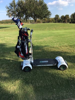 Elmo Weeks' golf clubs are strapped to a Golfboard and ready to roll at The Club at Savannah Harbor. Photo by Elmo Weeks/For the Savannah Morning News