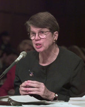 In this March 17, 1999, file photo, U.S. Attorney General Janet Reno testifies before the Senate Governmental Committee in Washington. The committee is considering whether to renew the Independent Counsel Statute. Reno, the first woman to serve as U.S. attorney general and the epicenter of several political storms during the Clinton administration, has died early Monday, Nov. 7, 2016. She was 78. (AP Photo/Dennis Cook, File)