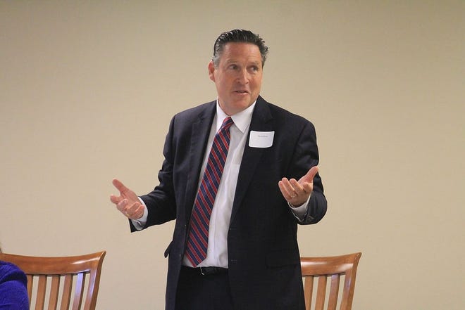 Mark Hanson, shown speaking at a Supervisor forum held by the Waukee Chamber of Commerce in October, won re-election to the Board of Supervisors Tuesday night.