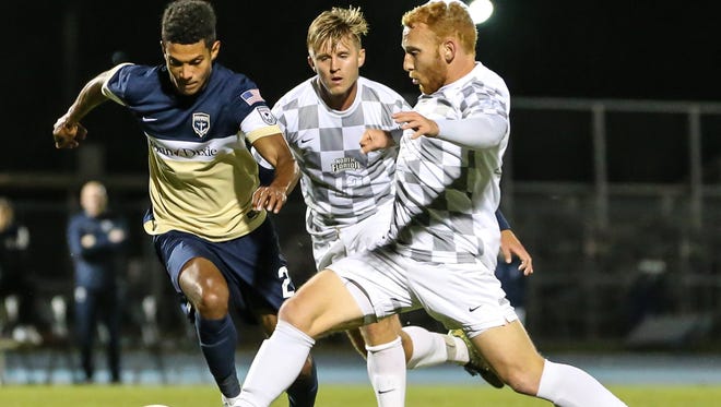 Bolles graduate and University of North Florida senior Jay Bolt (right), shown during a February exhibition match against the Jacksonville Armada, was named the Atlantic Sun Conference defender of the year. (The Florida Times-Union, Gary Lloyd McCullough)