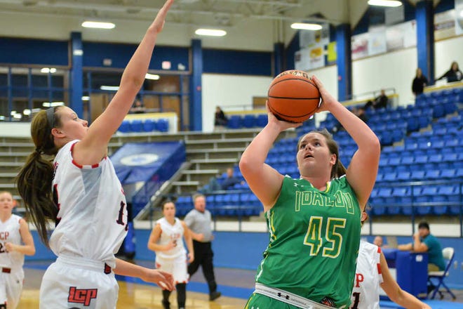 Idalou's Kaitlyn Smith (45), shown shooting during a game early last season, returns after missing most of last season with an injury.