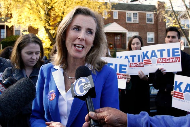 Pennsylvania Democratic Senate candidate Katie McGinty addresses a reporter's question after casting her ballot, Tuesday Nov. 8, 2016, in Wayne, Pa.
