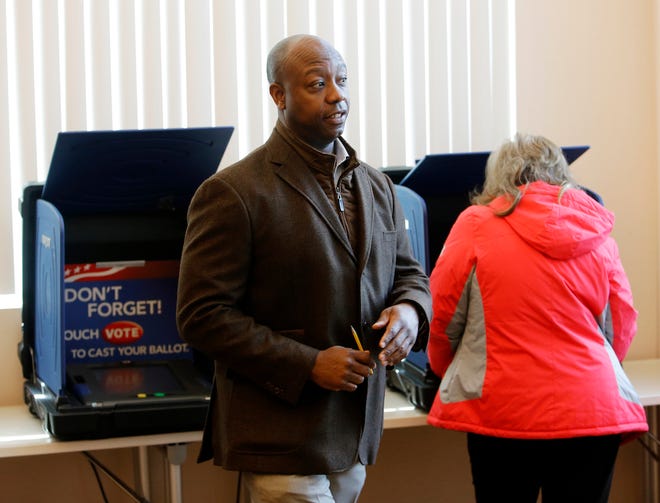 Sen. Tim Scott, R-S.C., walks away after voting at Hanahan Fire Station #3 in Hanahan on Tuesday. - AP Photo/Mic Smith
