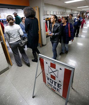 Voters wait in line on Election Day, Nov. 8, 2016.