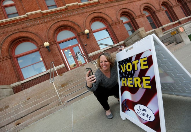 Judy Chatfield, poses for a selfie after voting, Tuesday Nov. 8, 2016 in front of the South Lee County Courthouse in Keokuk, Iowa. Lee County were voting on a $8.5 million bond measure that would construct a new courthouse near Montrose, roughly between Fort Madison and Keokuk.