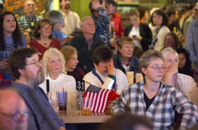 Hillary Clinton supporters react as Florida is called for Donald Trumpduring a Democratic Party election party at Whirled Pies in Eugene. (Andy Nelson/The Register-Guard)