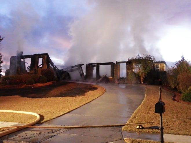A home on Garnet Trail in Oconee County was destroyed by fire Tuesday morning. Photo by Joe Reisigl
