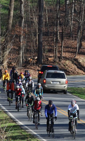 (Photo Mike Hensdill/The Gaston Gazette) Cyclists make their way along Cramer Mountain Road in January 2016 as they take part in the annual Polar Bear Ride.