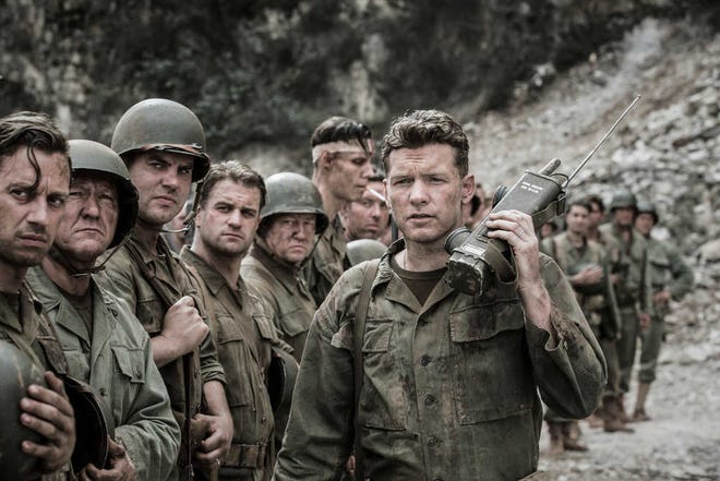 This image released by Summit shows Sam Worthington in a scene from "Hacksaw Ridge." (Mark Rogers/Summit via AP)