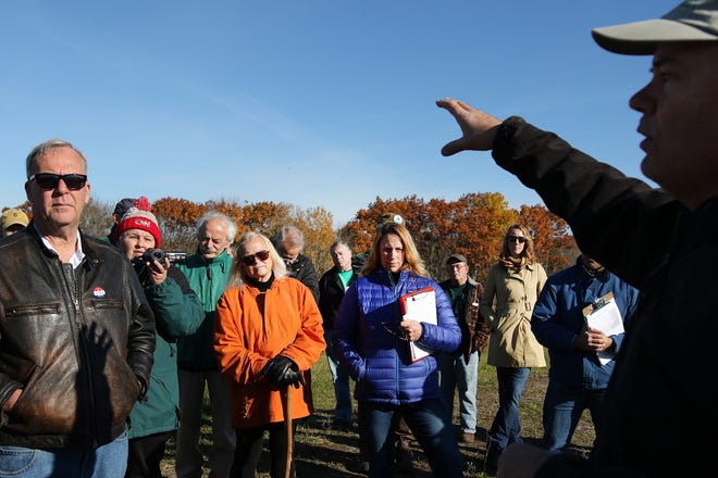 A group of concerned Seacoast residents and officals tour the Coakley Landfill in North Hampton on Thursday with environmental engineers including Mike Deyling, a hydrogeological scientist with CES Inc.

Photo by Rich Beauchesne/Seacoastonline