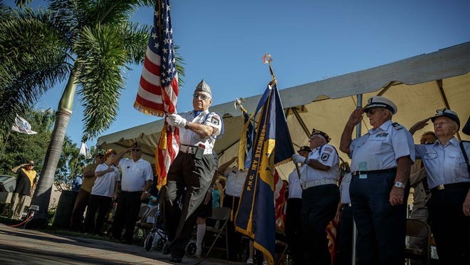 Kurt Leuchter, Boynton Beach, leads the color guard procession at the 2014 Veteran's Day ceremony at Veteran's Park in Boynton Beach, Fla. on Tuesday, November 11, 2014. Leuchter is part of Jewish War Veterans Post 440 in Boynton Beach.(Thomas Cordy / The Palm Beach Post)