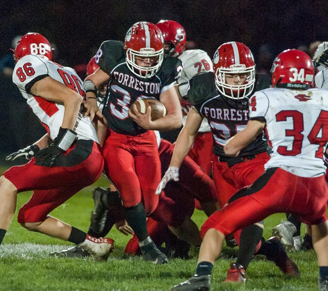 Matt Akins slips through the line for a 2-yard gain during the first quarter of the Class 1A playoff game in Forreston Saturday, Nov. 5, 2016. RANDY STUKENBERG/CORRESPONDENT/RRSTAR.COM & THE JOURNAL-STANDARD