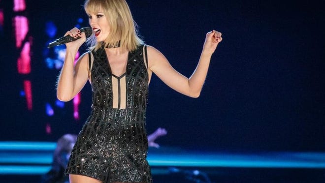 Taylor Swift plays Saturday at Circuit of The Americas after the day’s Formula One activities. Swift said from the stage that the crowd numbered 80,000 — and it certainly seemed plausible. Photo by Suzanne Cordeiro/Special to the American-Statesman