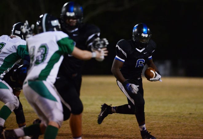 Bethel Christian Academy's Javon Edwards runs the ball in for a touchdown Friday against Halifax Academy in the second quarter.