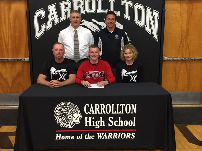 Submitted photo



Carrollton High School cross country standout Cole Lovett committed to Youngstown State on early national signing day Wednesday. He accepted an athletic scholarship from Coach Bryan Gorby. Pictured with him are father, P.J and mom Stephanie. Principal Dave Davis and Carrollton cross country/track head coach Mike Aukerman.