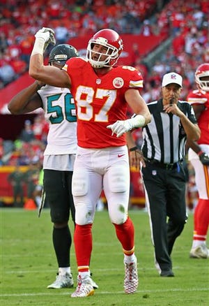 Kansas City Chiefs tight end Travis Kelce (87) throws a towel toward Field Judge Mike Weatherford after receiving an unsportsmanlike conduct penalty during an NFL game against the Jacksonville Jaguars on Sunday Nov. 6, 2016 at Arrowhead Stadium in Kansas City, Mo. The Chiefs won the game 19-14. (AP Photo/TUSP, Jay Biggerstaff)