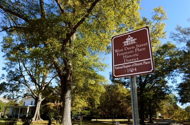 A sign along West Davis Street designates the historic district, one of several in Burlington. This one has 154 houses and other buildings.