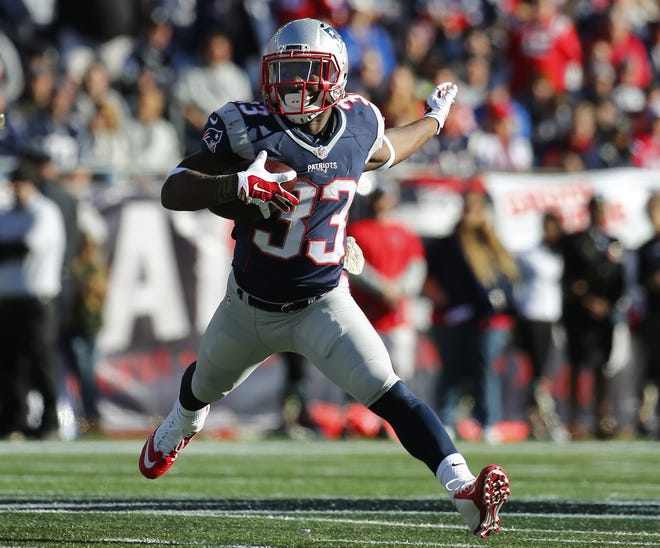 New England running back Dion Lewis hasn't returned to action for the Patriots this season after second knee surgery. Winslow Townson/AP Images