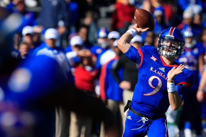 Kansas quarterback Carter Stanley delivers a pass during the first half of Saturday’s game against Iowa State at Memorial Stadium in Lawrence. Stanley, a redshirt freshman, is expected to remain starter for the Jayhawks’ next game against Texas, KU coach David Beaty said following the 31-24 loss to ISU. (The Associated Press)