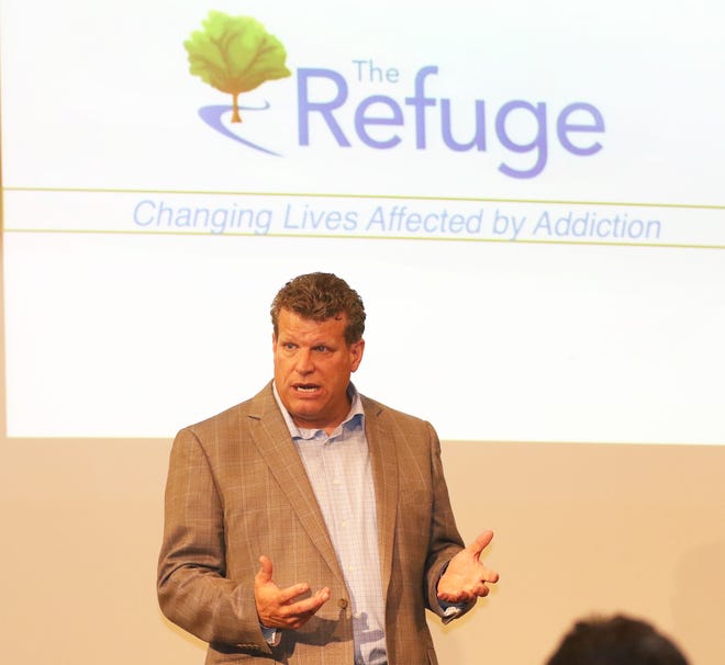 TIMES-REPORTER JIM CUMMINGS

Tom Thompson, director of The Refuge, speaks to a group of church leaders and community officials at the Drug Addiction Roundtable held recently at the Authentic Church training and office building in New Philadelphia. (TimesReporter.com / Jim Cummings)