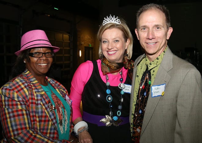 Olivia Davis, Laura Green and Mike Green enjoy themselves at the inaugural Mismatched Ball at the Tuscaloosa River Market on Oct. 16, 2014. The third annual ball will be held from 6-9 p.m. Nov. 22 at the Tuscaloosa River Market. staff photo | Erin Nelson