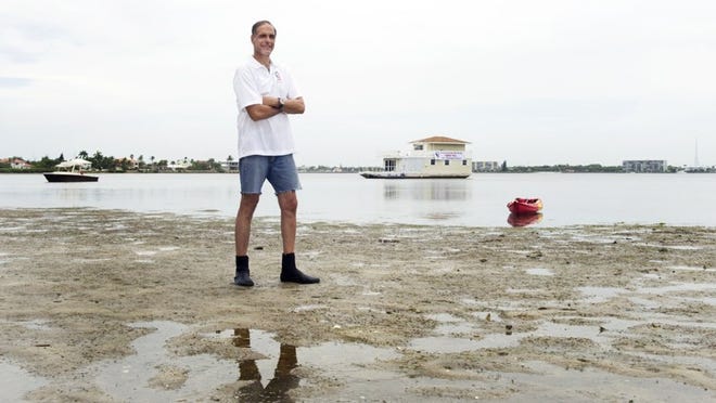 Fane Lozman stands on his Singer Island property in Riviera Beach. A Palm Beach County circuit judge ordered Riviera Beach on Monday Nov. 14, 2016 to give Lozman a street address for the property. (Meghan McCarthy / The Palm Beach Post)
