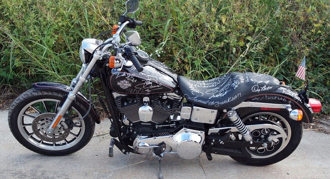 Leake Auction Co. will offer Jay Leno's Harley-Davidson FXDL Dyna Low Rider during their fall auction on Nov. 18, 19 and 20 in Dallas to benefit St. Jude Children's Research Hospital. The bike was autographed by numerous celebrities. PHOTO COURTESY LEAKE AUCTION CO.