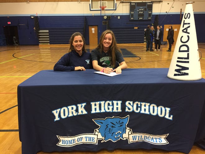 York High School senior Allie Lawlor, right, with her mother Jodie, signs her National Letter of Intent to play women's lacrosse and field hockey next year at Endicott College, a Division III program in Beverly, Mass. Courtesy photo