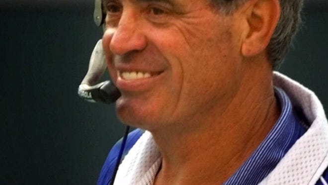 3cc for 11/22; mora; dti; b/w; 10p x 2.42in deep Indianapolis Colts coach Jim Mora smiles while being booed by Philadelphia Eagles fans after calling for a review of the Eagles' first touchdown which came in the fourth quarter, Sunday, Nov. 21, 1999, in Philadelphia. The touchdown was upheld, but the Colts won 44-17. (AP Photo/George Widman) ORG XMIT: PXS110