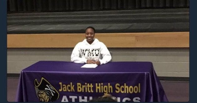 Fayetteville gymnast Stacie Harrison, a senior at Jack Britt, signed her National Letter of Intent with Western Michigan on Monday, Nov. 14, 2016.