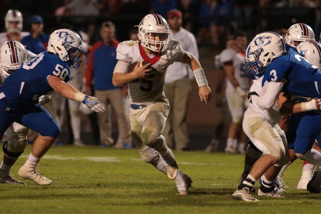 Jefferson’s Colby Clark (5) moves the ball downfield during the Jefferson vs. Oconee game at Oconee County High School Nov. 4, in Athens. (Photo/John Roark, Athens Banner-Herald)